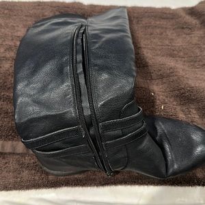 Black boots below the knee